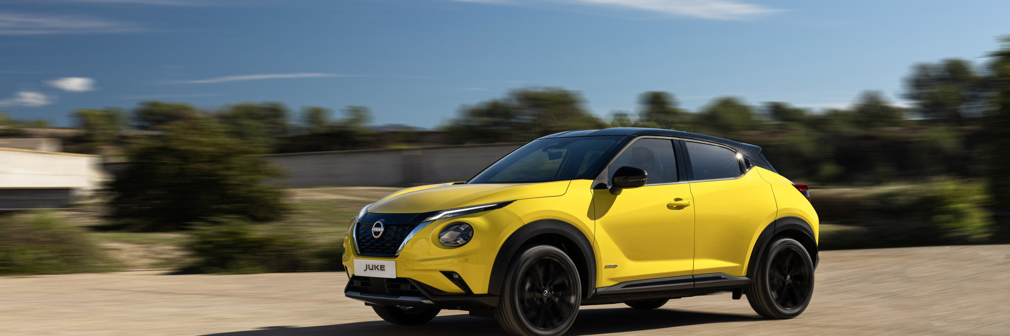 JUKE MC 2024 Exterior   iconic yellow body color N Sport dynamic front view 1