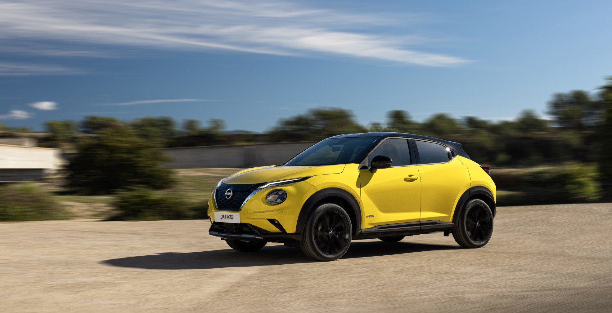 JUKE MC 2024 Exterior   iconic yellow body color N Sport dynamic front view 1